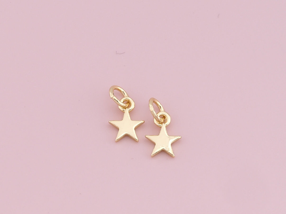 Gold star charm